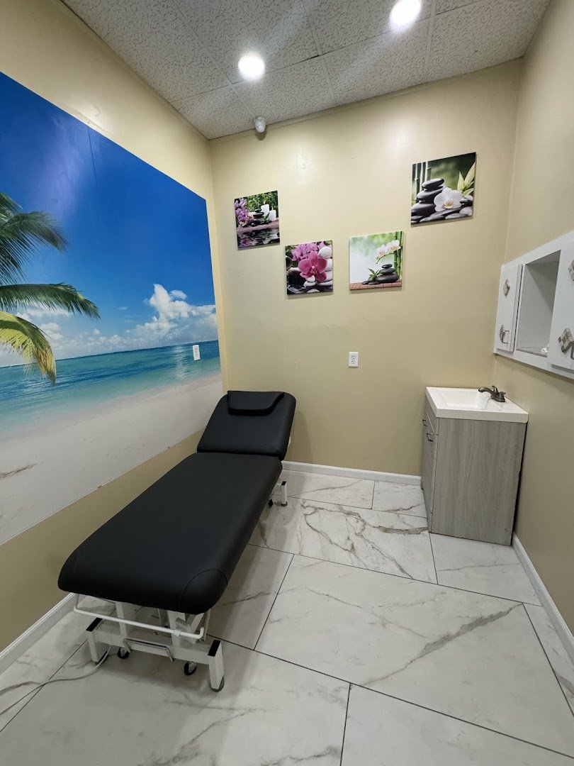 Facial spa room with a calm treatment bed.